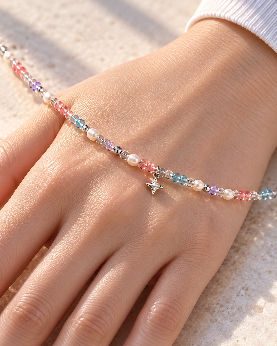 Fine beadwork and a tiny star, shown against an adult hand. AI concept.